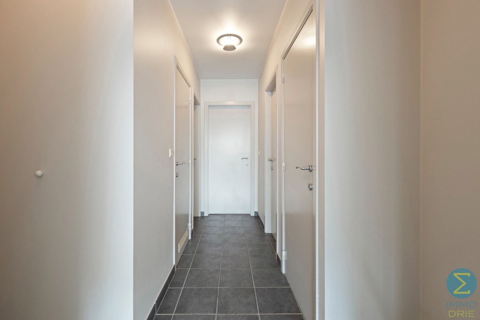Ruim 2-slaapkamerappartement met balkon, garage én kelder  foto 10