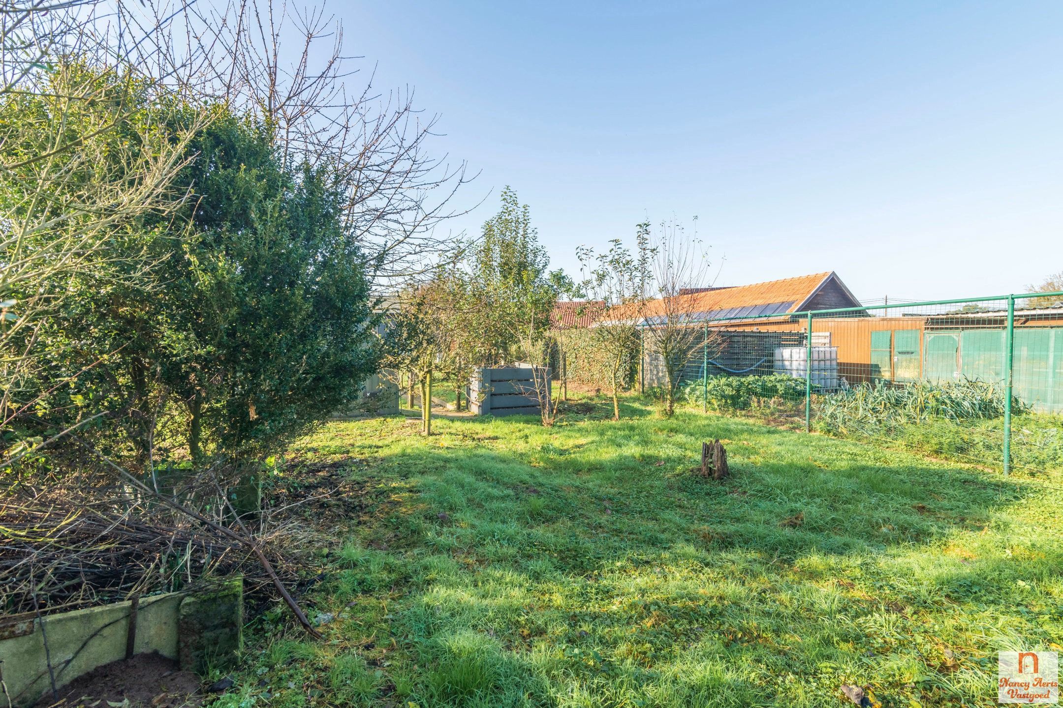 Sfeervolle gezinswoning met zonnige tuin in Paal foto 36