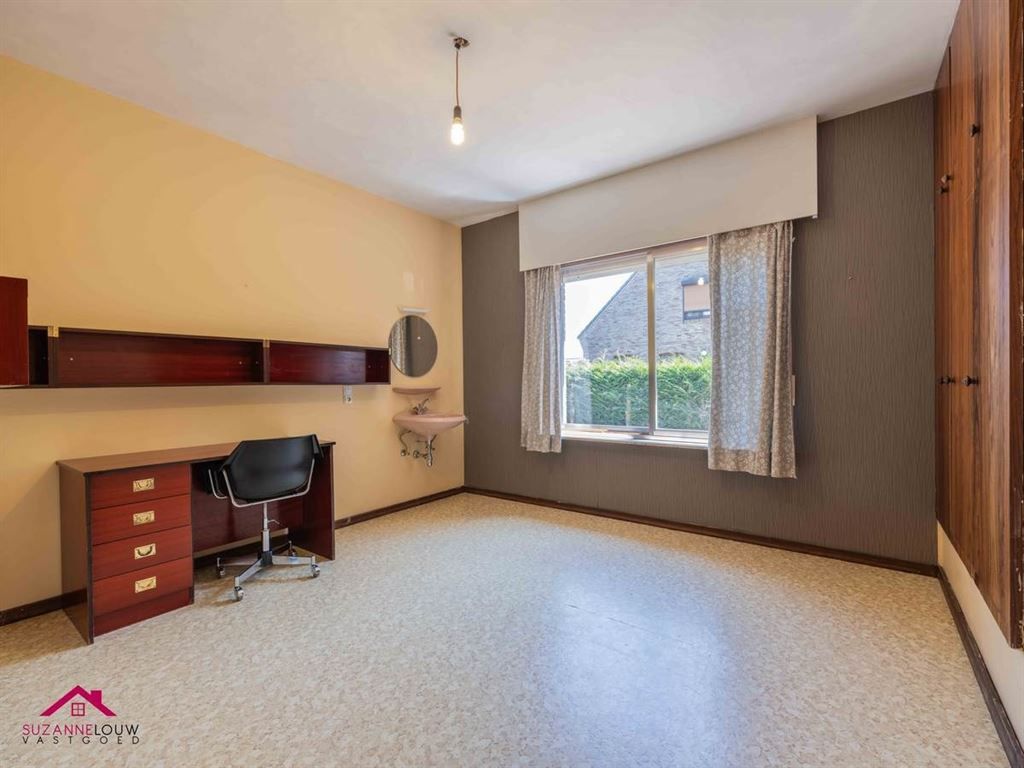 Vrijstaande, gelijkvloerse gezinswoning met inpandige garage foto 29