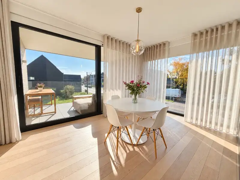 Luxueus designappartement met zuidterras, carport en ruime kelder foto 6