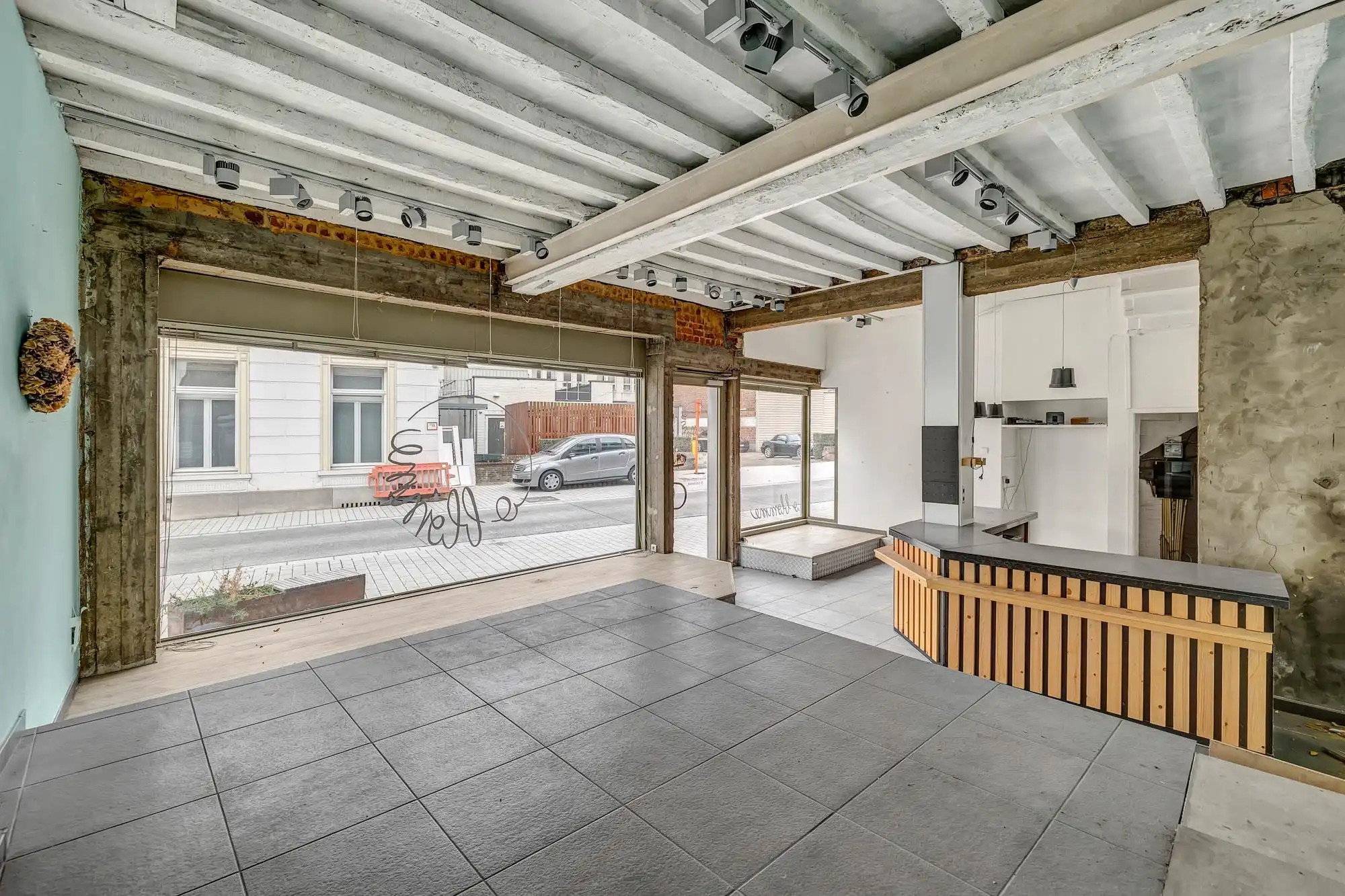 Opbrengsteigendom: Handelsruimte met 3 slpk app in centrum foto 3