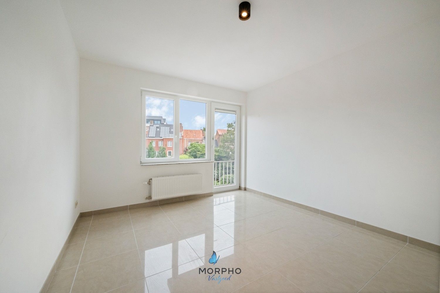 Modern en energiezuinig 2-slaapkamerappartement op de tweede verdieping in hartje Temse! foto 10