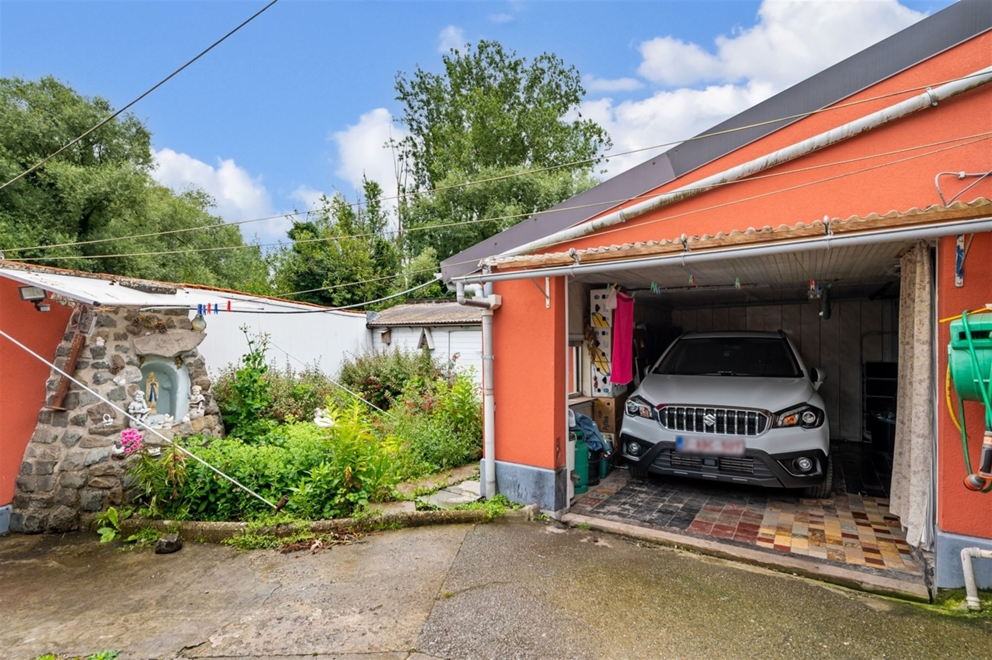 Verder af te werken woning met tuin en garage te Gijzegem. foto 14