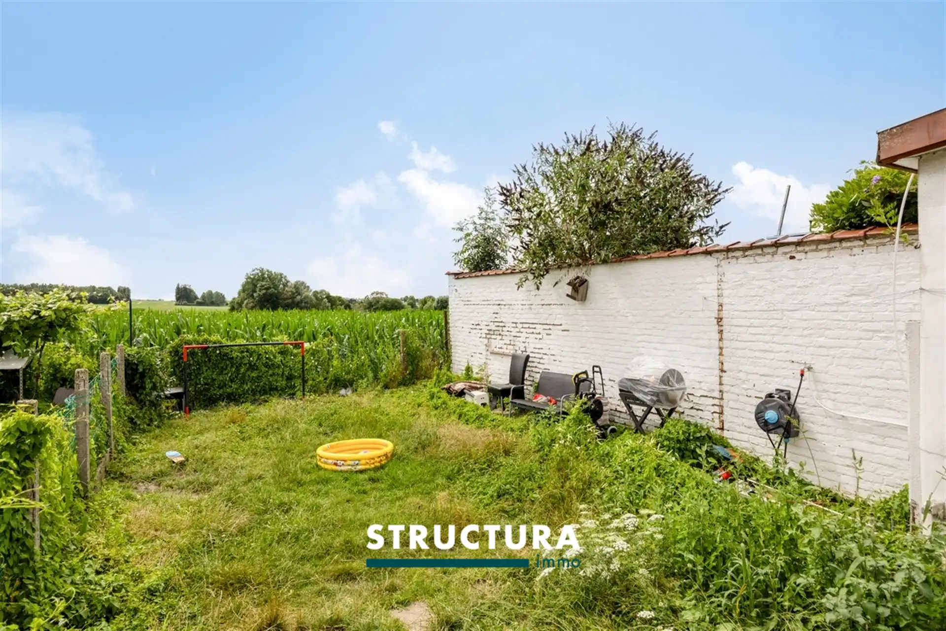 Woning met potentieel en uitzicht op de velden foto 3