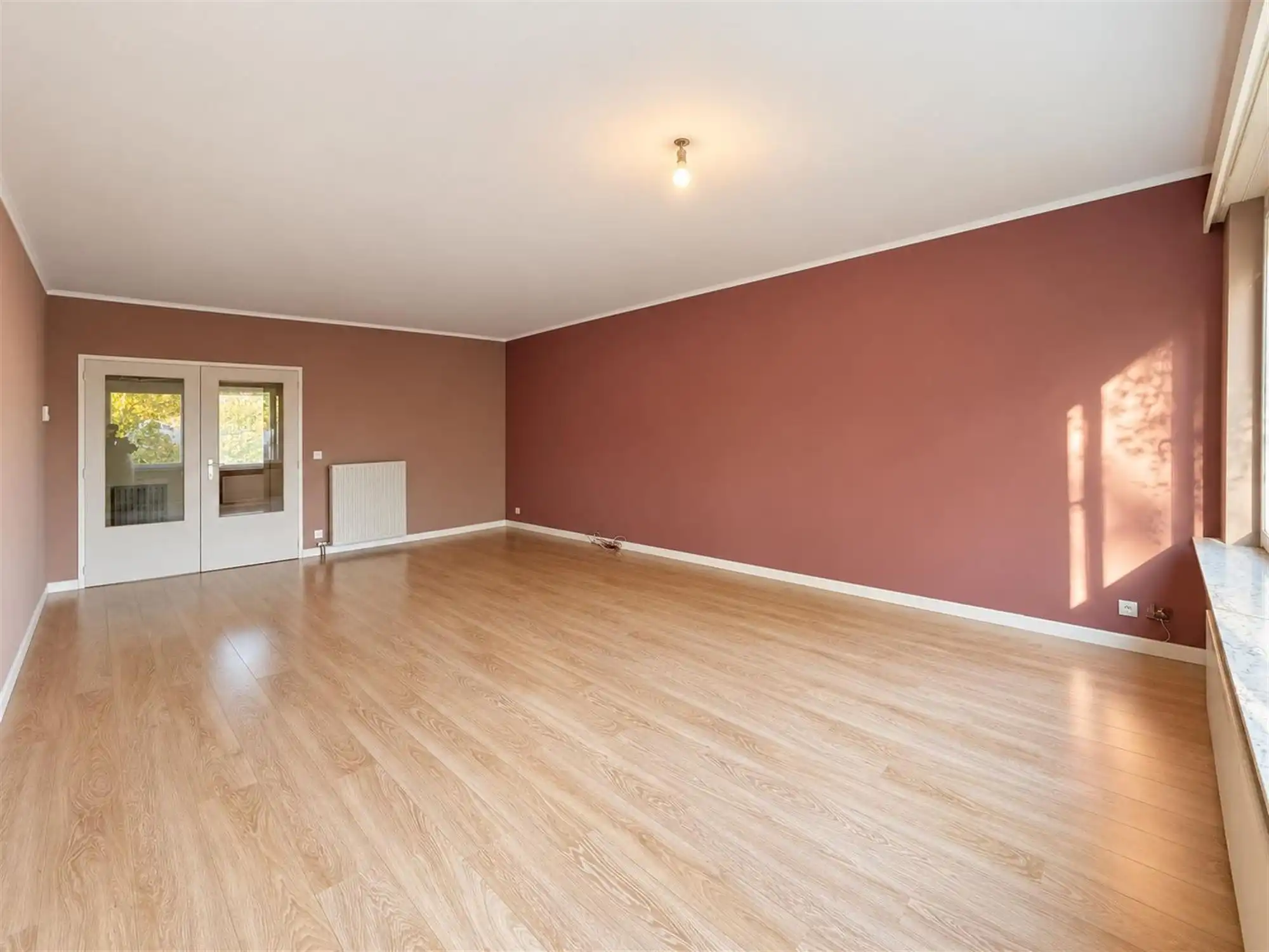 Instapklaar 2-slaapkamer appartement met terras en garage foto 3