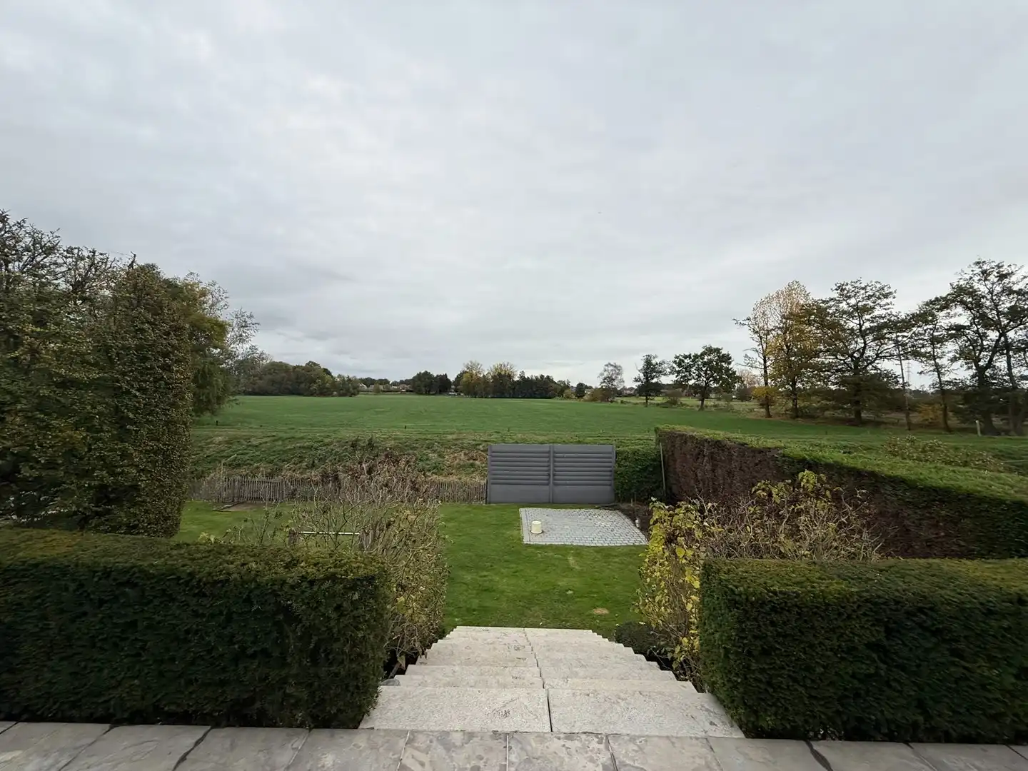 Gezellige instapklare woning met 3 slaapkamers en ruime tuin met prachtig zicht te Pelt. foto 26