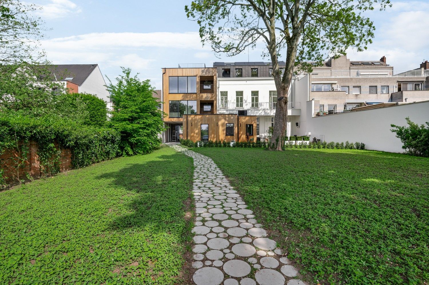 Uitzonderlijk dakappartement met 2 slaapkamers, bureau en een terras van 40m²! foto 2