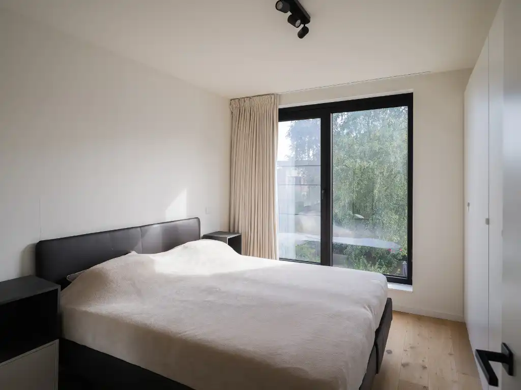 Lichtrijk appartement met twee volwaardige slaapkamers en zonneterras nabij het Baudelopark. foto 12