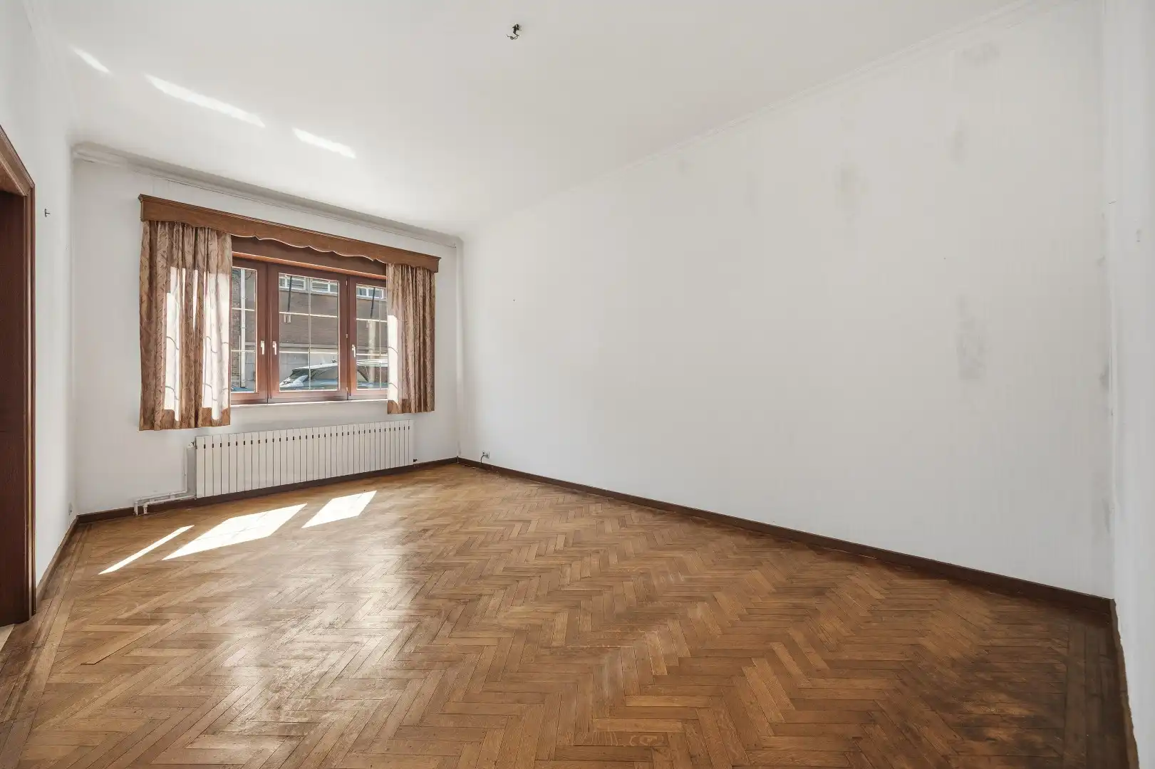 1 rijwoning en 2 appartementen in gezellig Hoegaarden foto 2