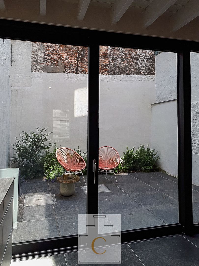 Trendy stadswoning - totaalrenovatie, strakke lijnen en een keitof terras - topligging Moerstraat foto 7