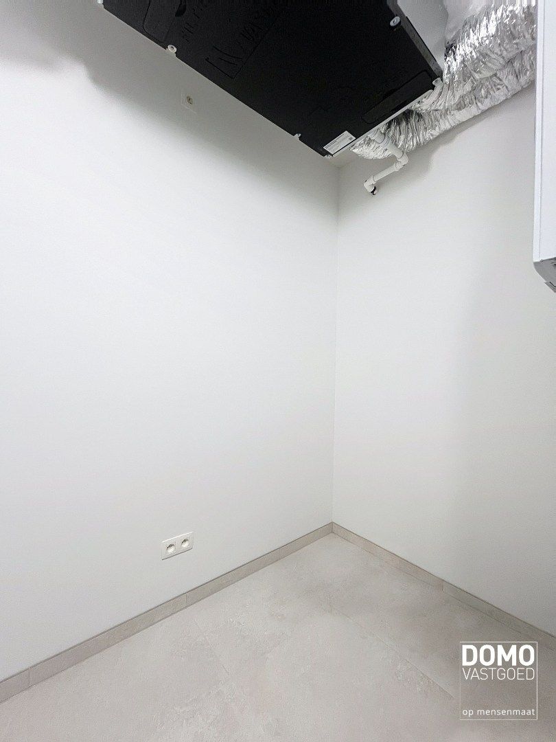 NIEUWBOUW 2 SLAAPKAMER APPARTEMENT MET TERRAS, AUTOSTANDPLAATS EN KELDERBERGING TE KERMT foto 10