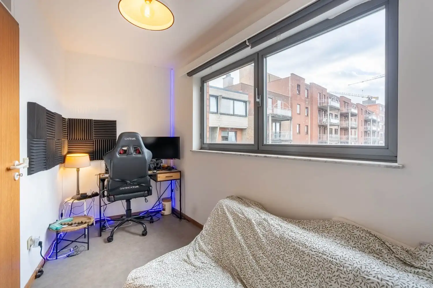 Centraal gelegen appartement met 2 slaapkamers, een terras en de mogelijkheid om een autostaanplaats en kelder bij aan te kopen te Leuven! foto 12