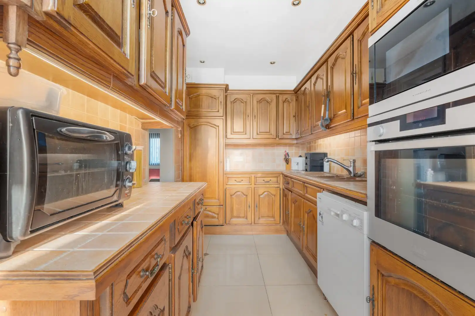 Charmante rijwoning met zonnig terras, wellnessruimte en garagebox in de Vicognewijk foto 10