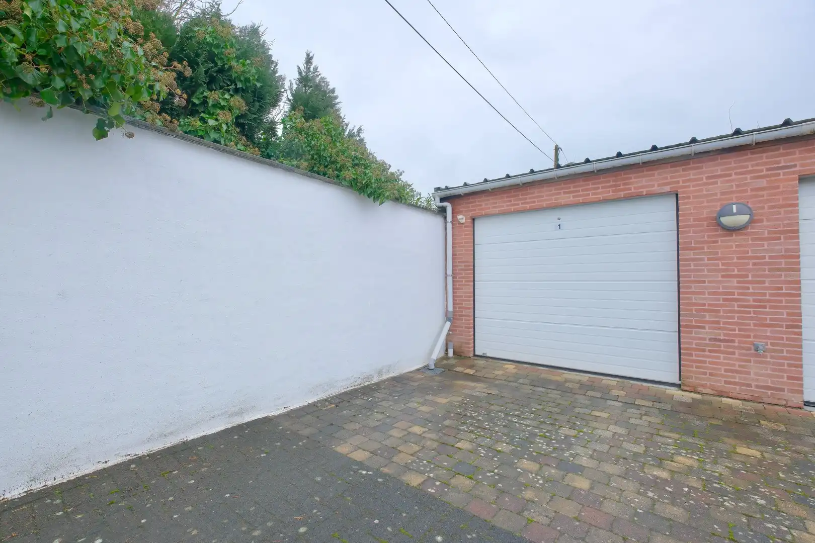 Gelijkvloers app met 2 slaapkamers, ruim terras en garage! foto 17