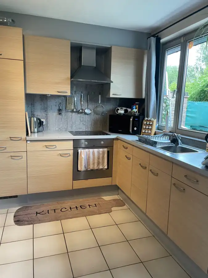 EENGEZINSWONING + garage & tuin foto 17