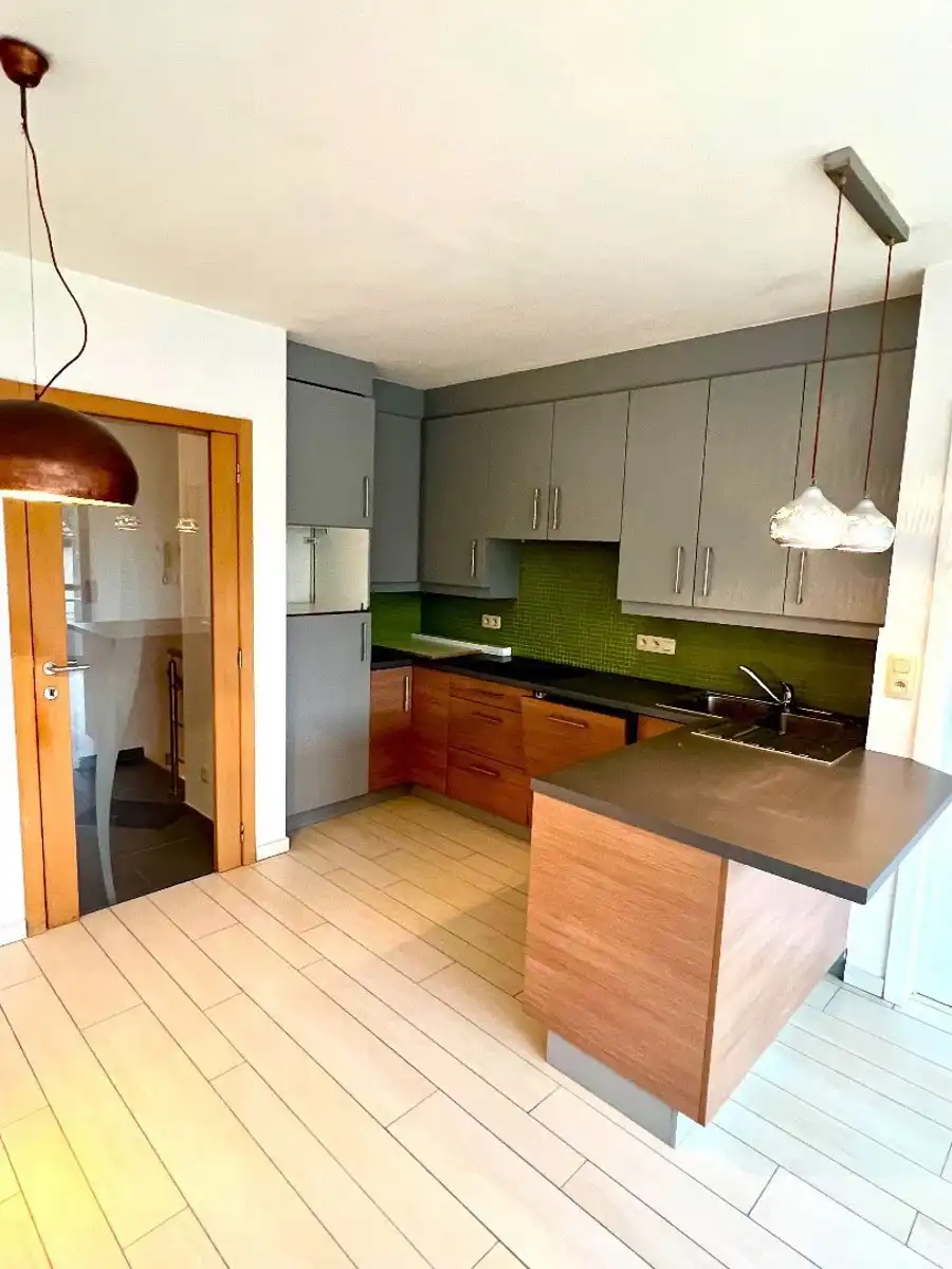 Duplex met terras, tuin en garage in Schepdaal foto 3
