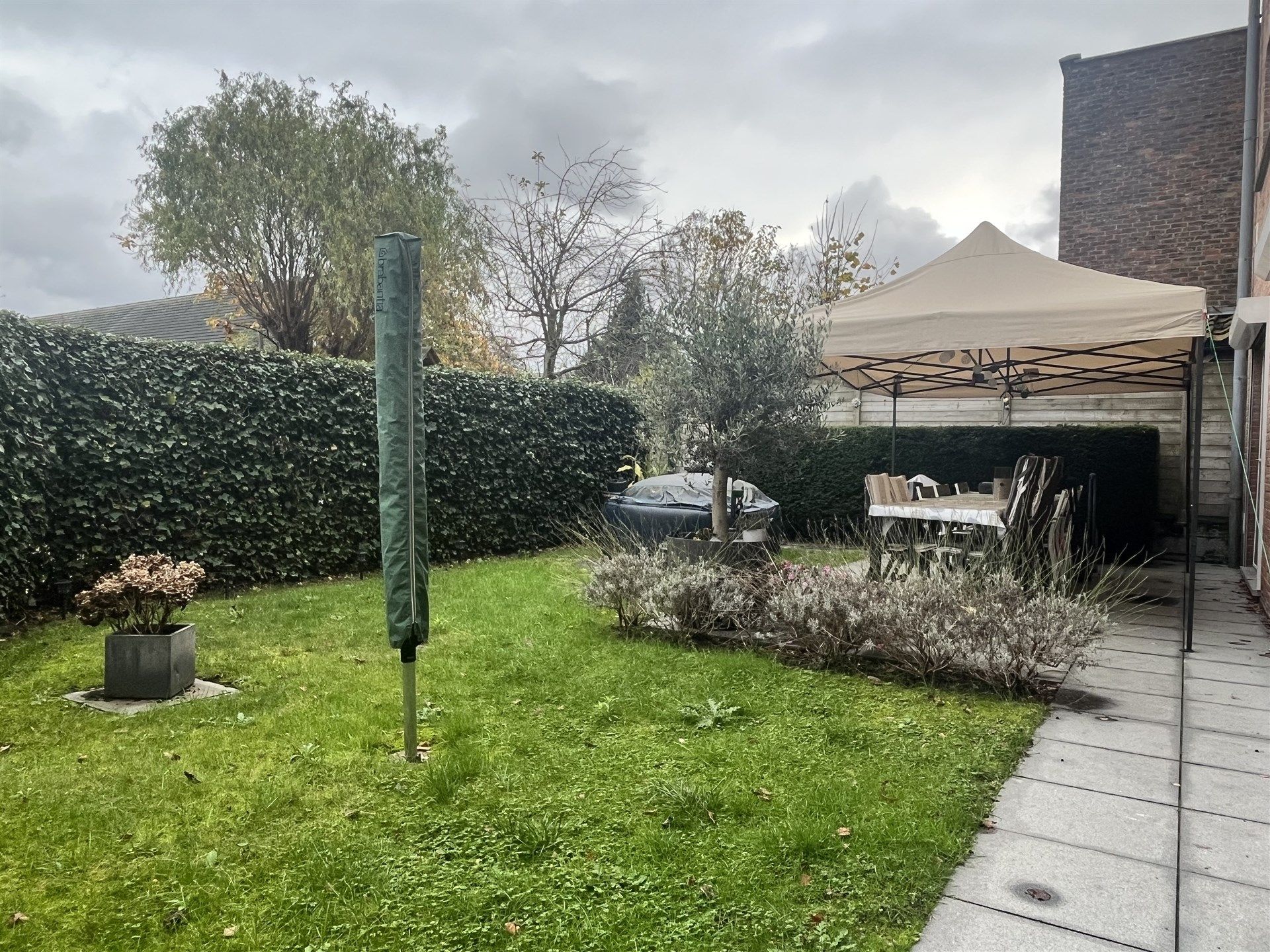 Ruim gelijkvloers 3 slpk-appartement met tuin én garagebox! foto 12