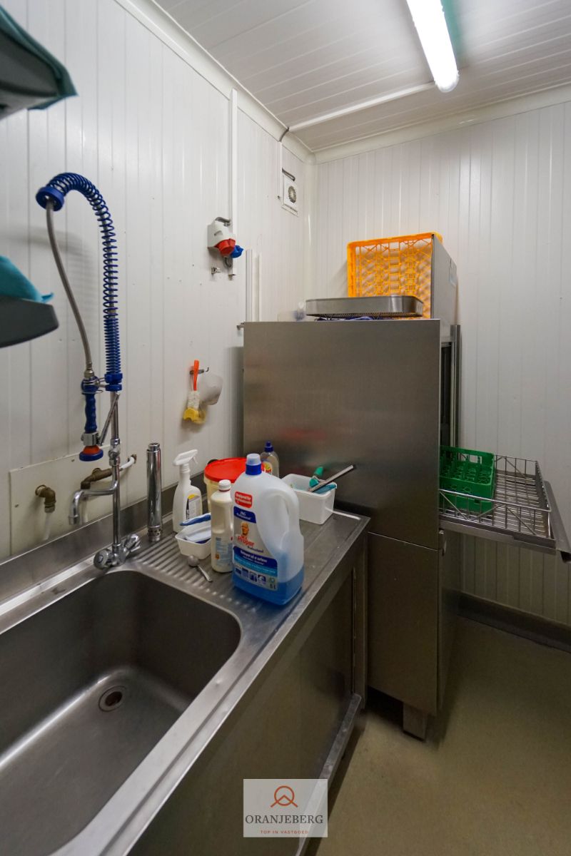 Volledig gerenoveerde winkelruimte + atelier met garage te huur in Gentbrugge foto 12