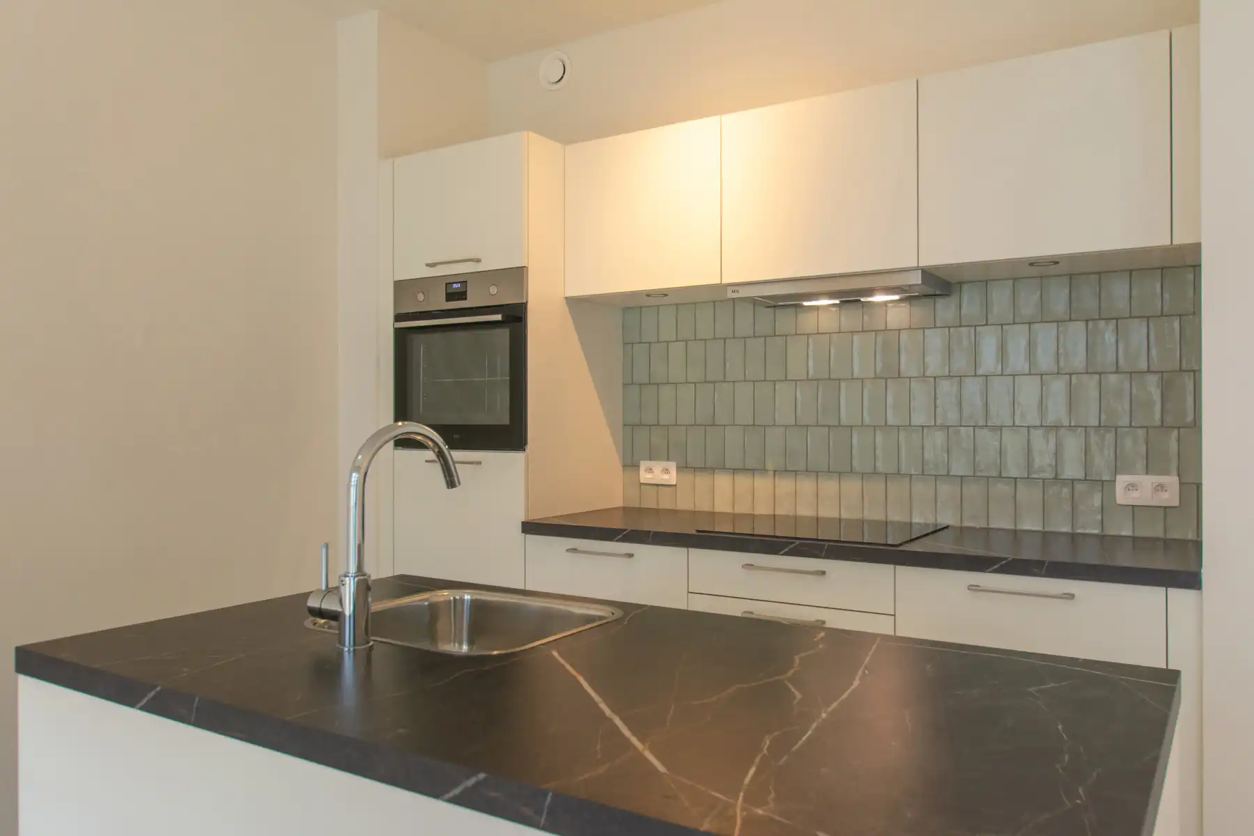 Lichtrijk nieuwbouwappartement met 2 slaapkamers en terras foto 2