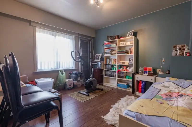 Rustig gelegen, ruime woning met 4 slaapkamers, tuin en garage. (ENERGIELABEL C) foto 12