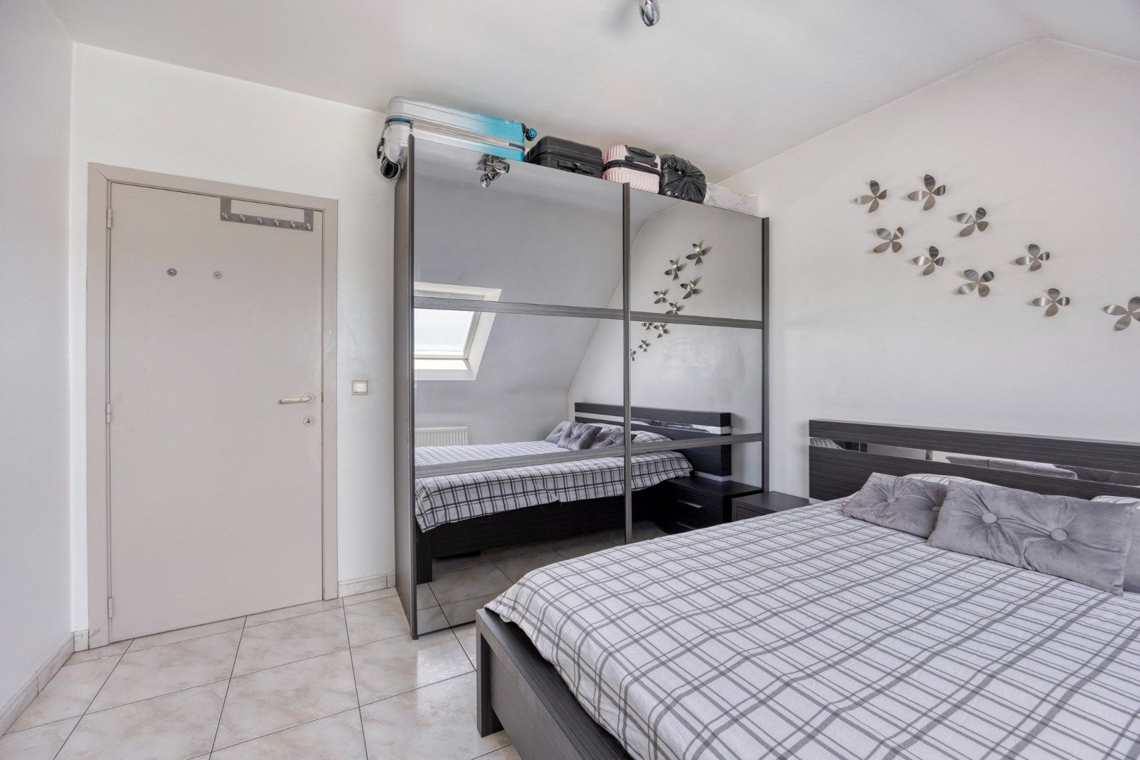 Ruim en licht appartement met 2 slaapkamers én zolderruimte foto 14