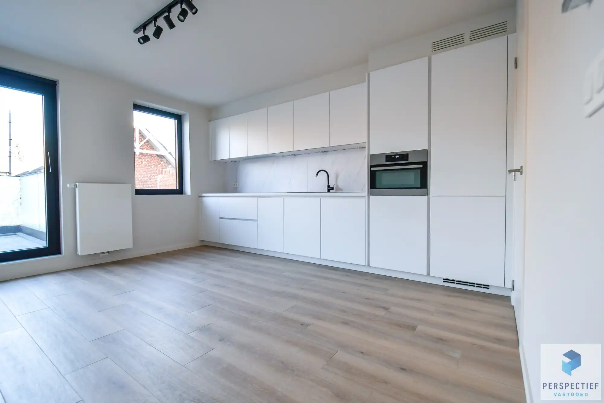 BEZOEKMOMENT WOENSDAG 10/06 VAN 16U30 TOT 18U | RECENT ENERGIEZUINIG APPARTEMENT met TERRAS & AUTOSTAANPLAATS foto 7