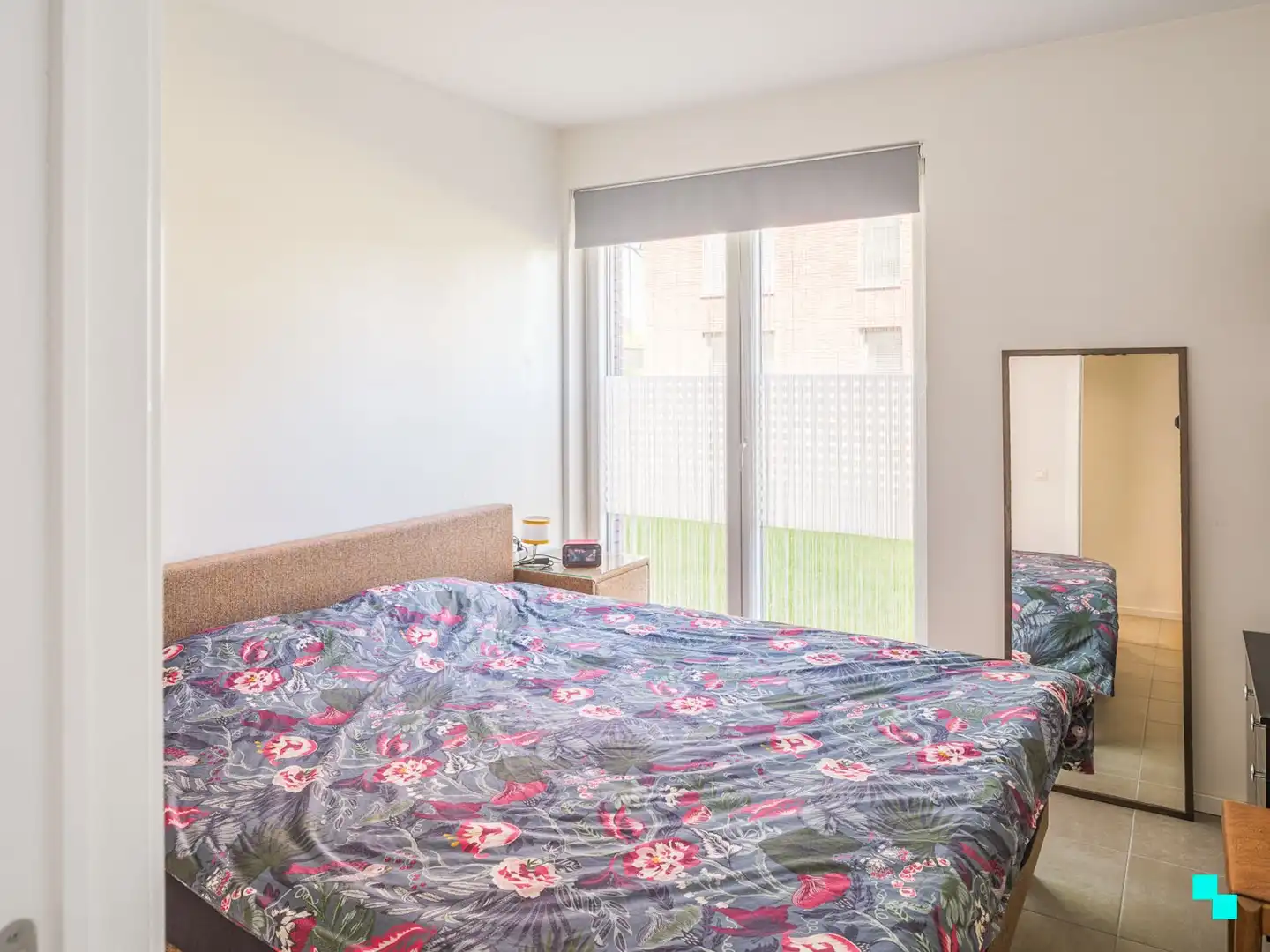Gelijkvloers appartement omgeven door groen aan de Sint-Denijskerk foto 13
