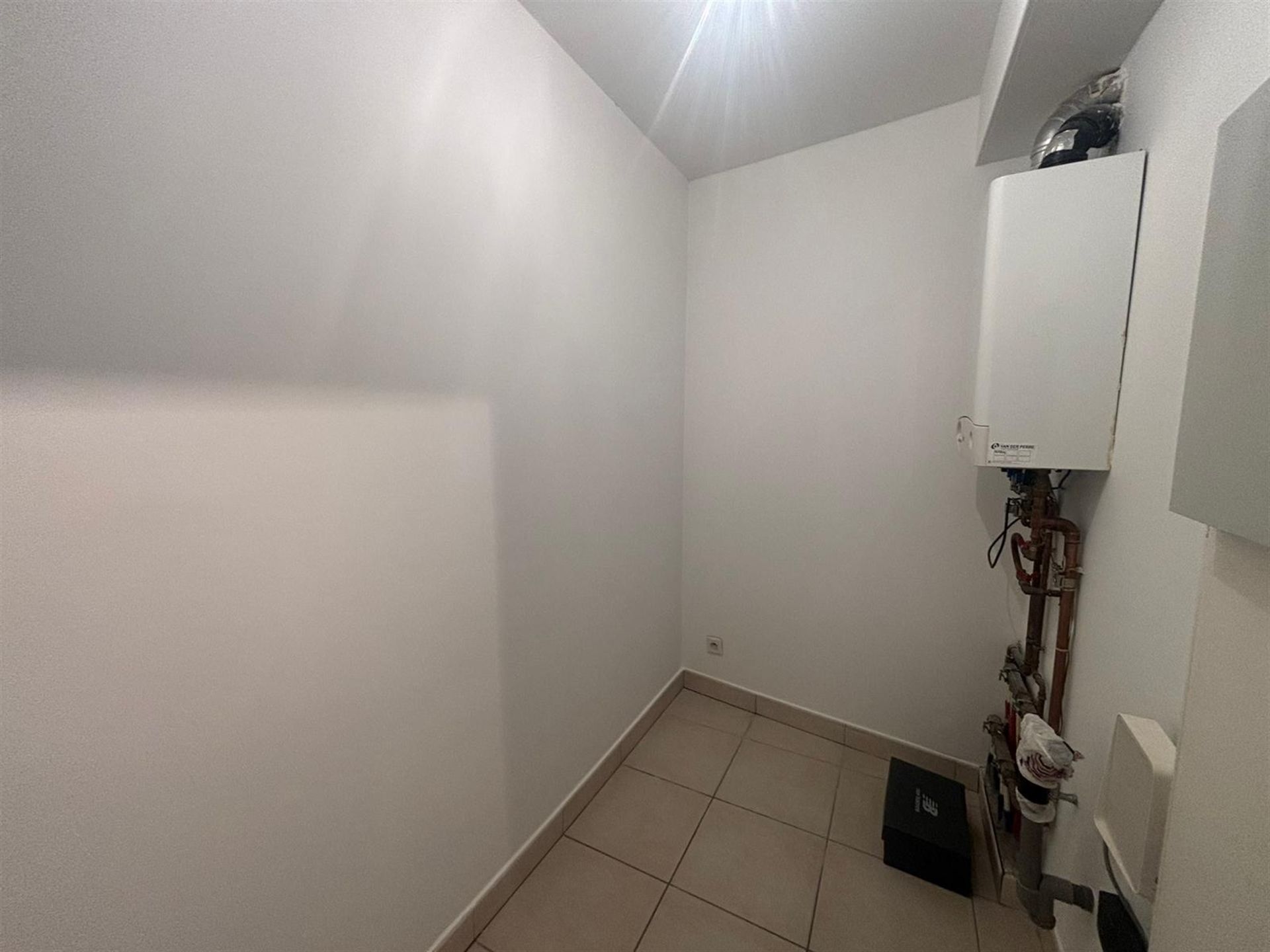 Duplex-appartement met extra zolderkamer + garagebox in het centrum! foto 25