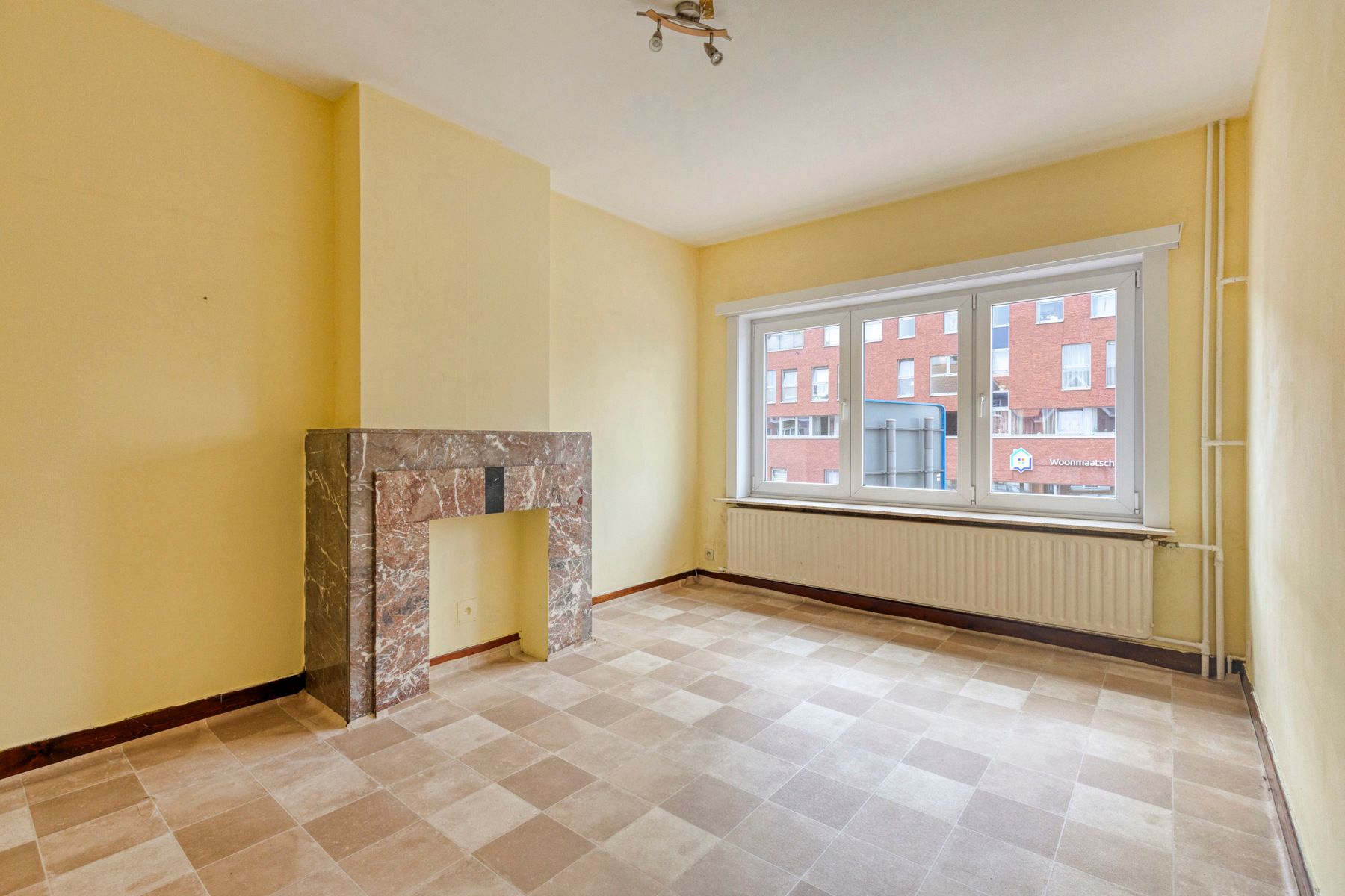 Centraal gelegen rijwoning met 4 slaapkamers foto 11