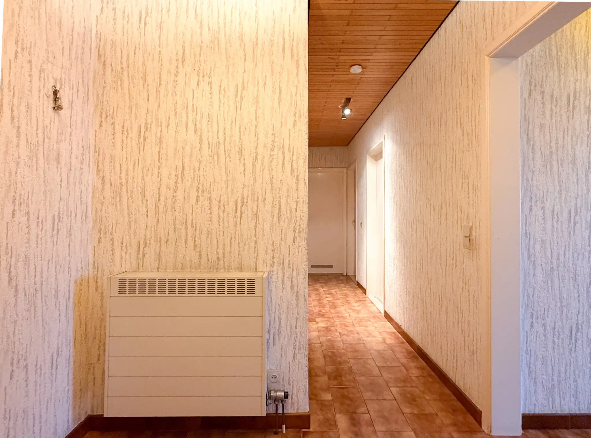 Ruim gelijkvloers appartement met tuin, garage en 3 kamers foto 3