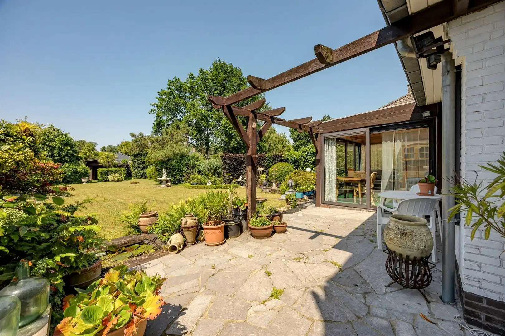 Karaktervolle villa op prachtig perceel van 1.063 m² in residentieel Schoten foto 3