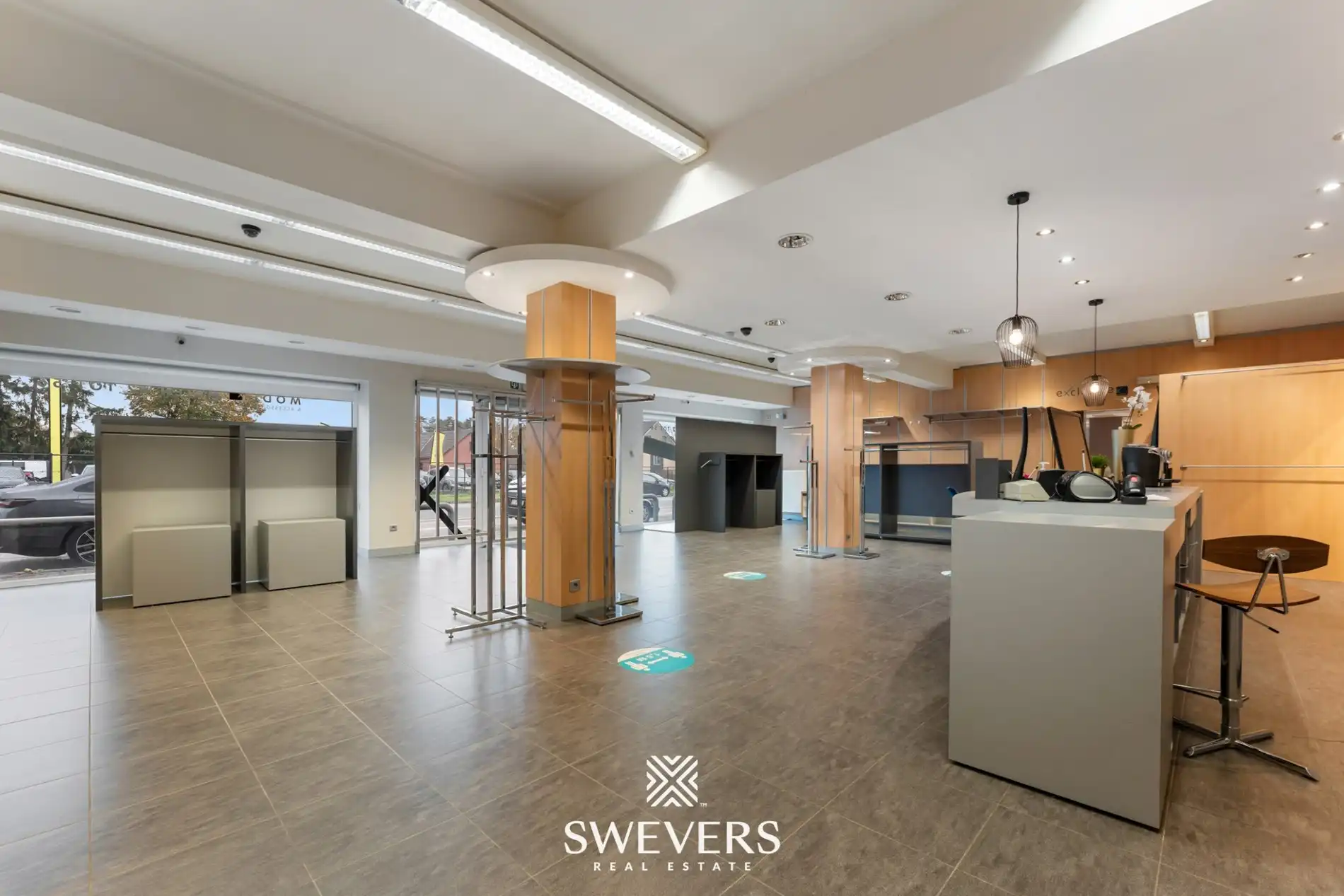 Opbrengsteigendom met handelspand, ruim appartement en uitbreidingspotentieel in hartje Heusden-Zolder foto 8