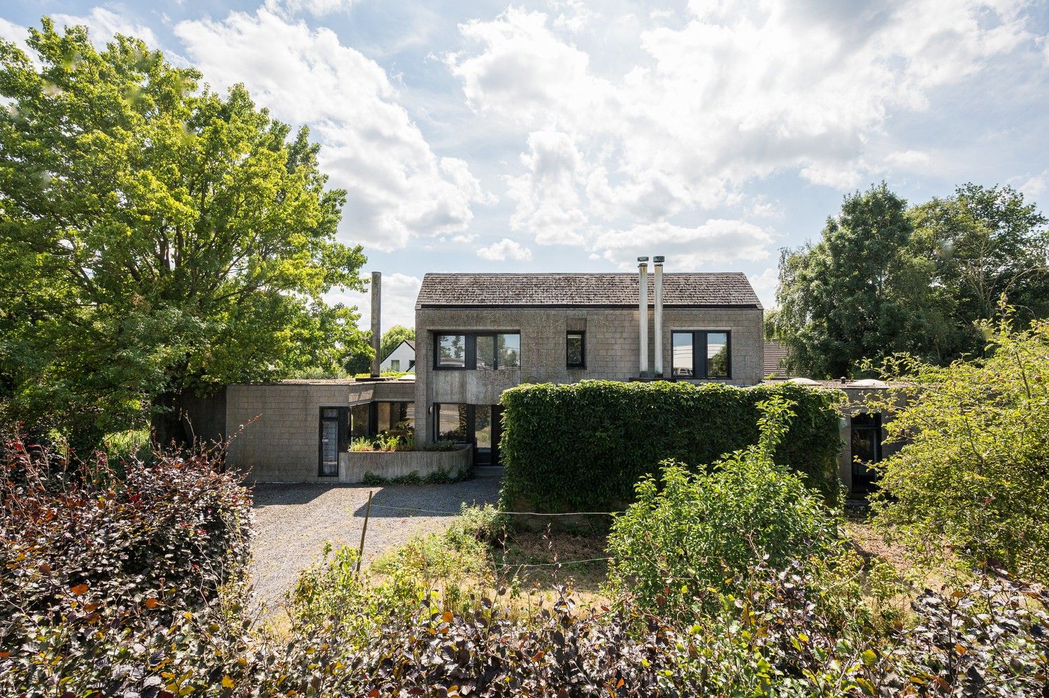 Modernistische villa met praktijkruimte en zuidwestgerichte tuin op riant perceel in Lembeke foto 2