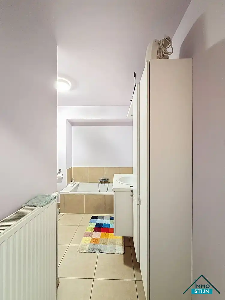 Ruim gelijkvloers appartement foto 9