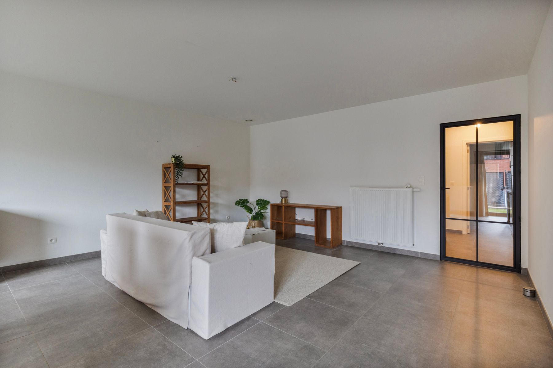 Gelijkvloersappartement met autostaanplaats en tuin in centrum Zele foto 4