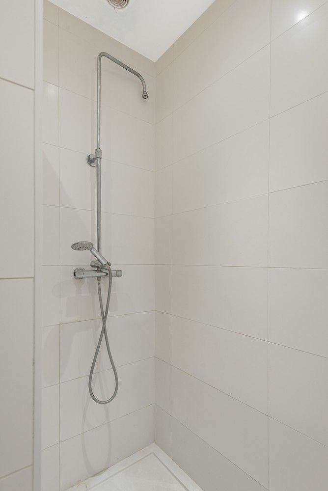 Opbrengsteigendom met 2 appartementen, tuin en garage te koop in Deurne! foto 10