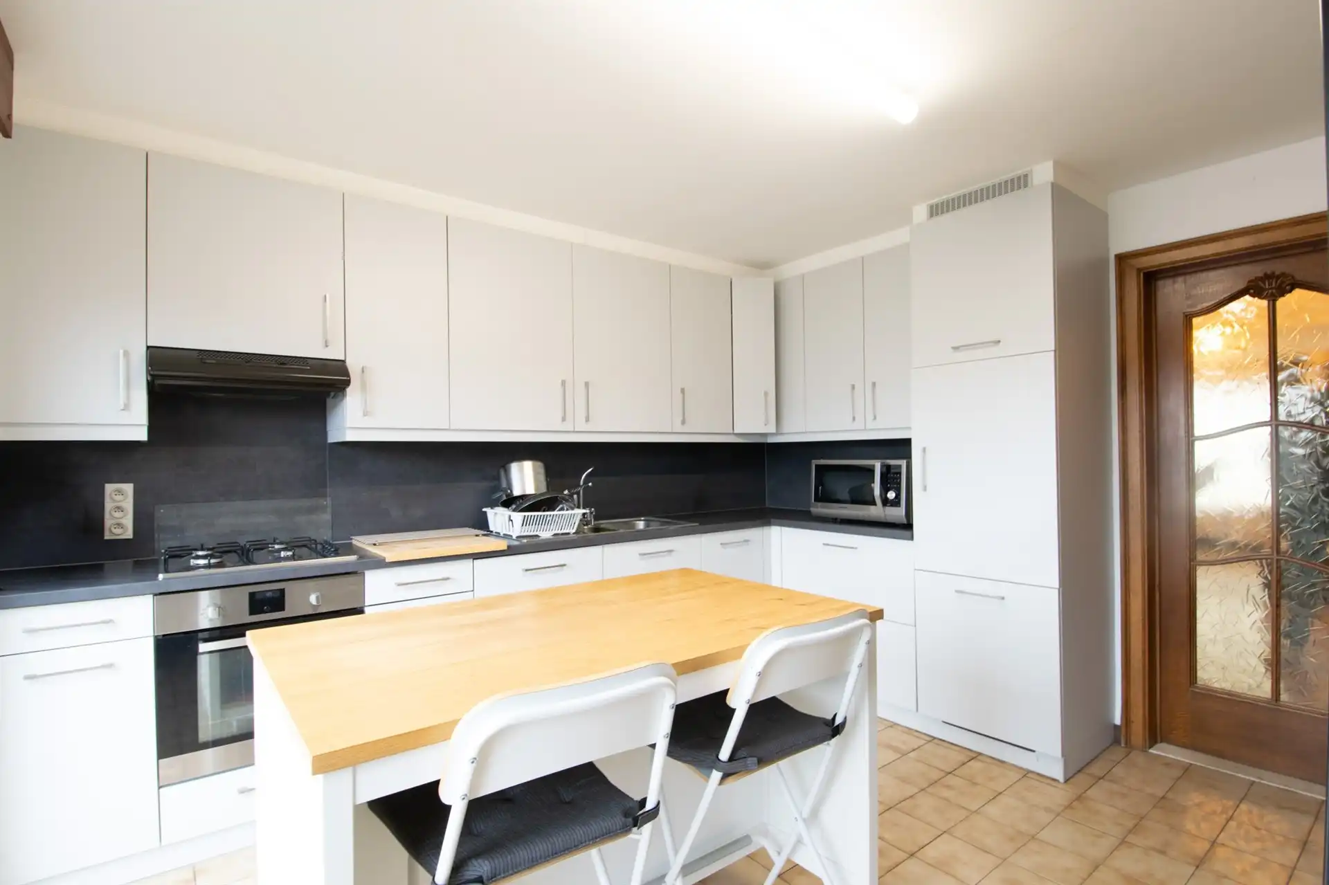 Ruime gezinswoning type bel-etage nabij centrum De Klinge foto 6