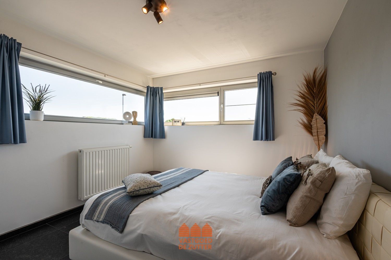 Ruim en lichtrijk appartement met inpandige garage en tuin in de groene rand van Deinze foto 10