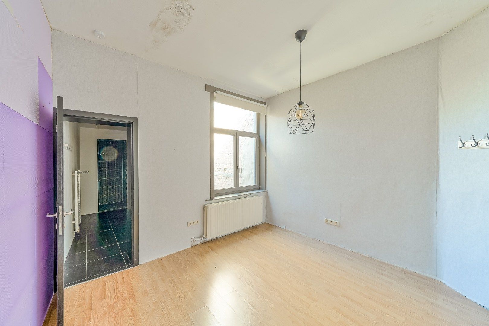 Te renoveren stadswoning met 5 slaapkamers, 3 badkamers en koer in hartje Oostende foto 7