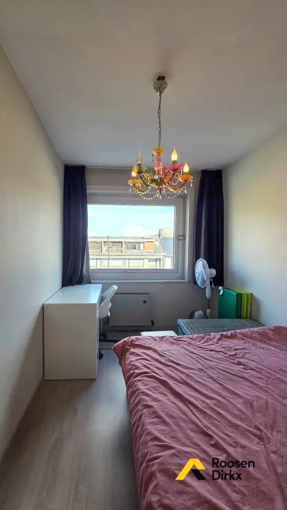 Verzorgd tweeslaapkamerappartement met parkeerplaats in centrum Bree. foto 12