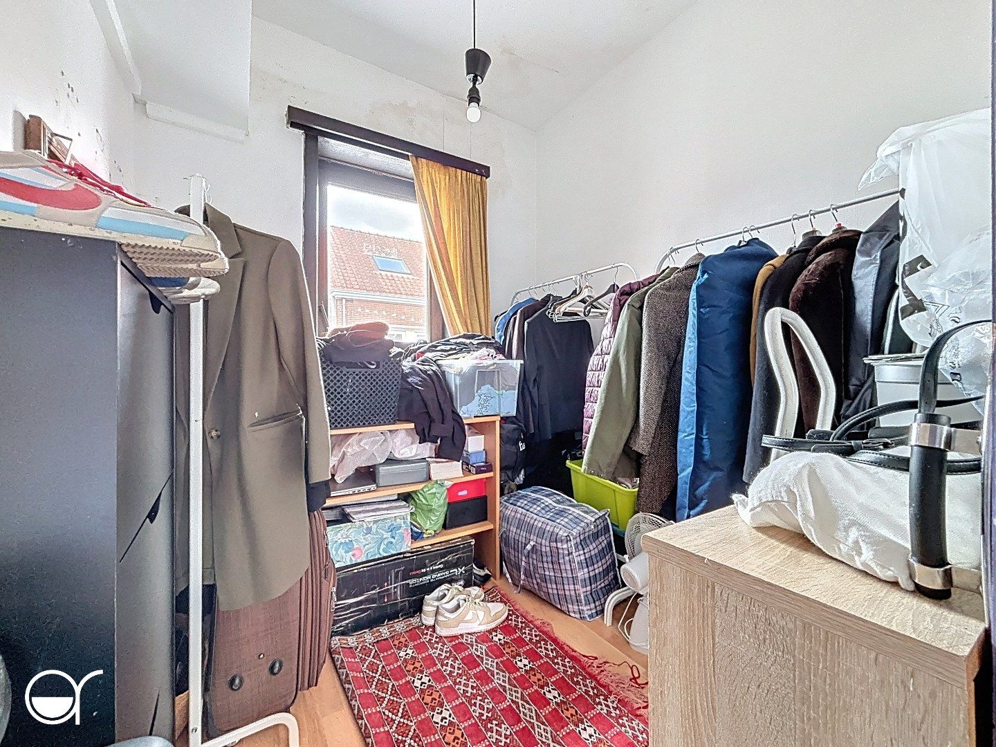 Te renoveren woning met zonnige tuin aan de Bourgoyen. foto 8
