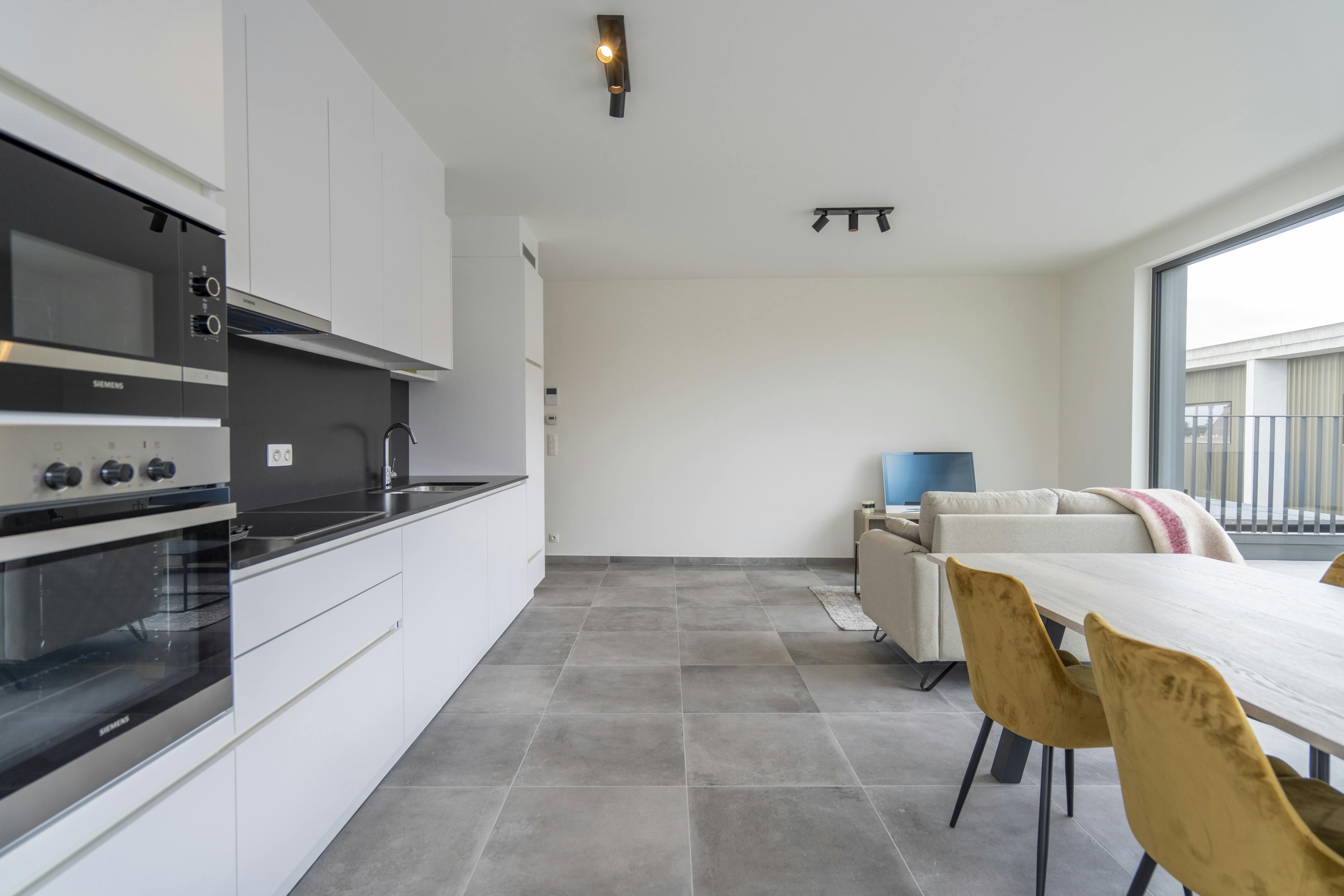 Instapklaar dakappartement / penthouse te koop in het centrum foto 24