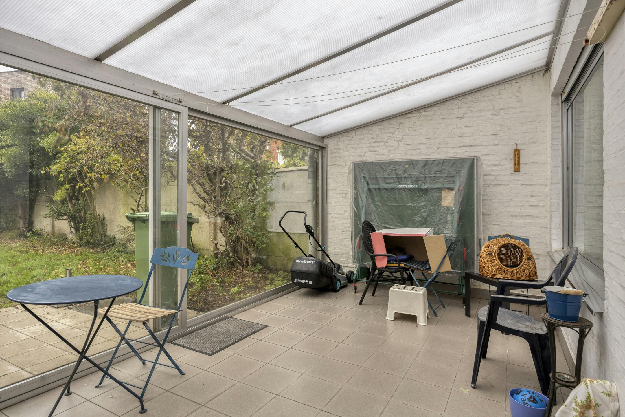 Ruim huis te koop Merksem met garage en zonnige tuin foto 9