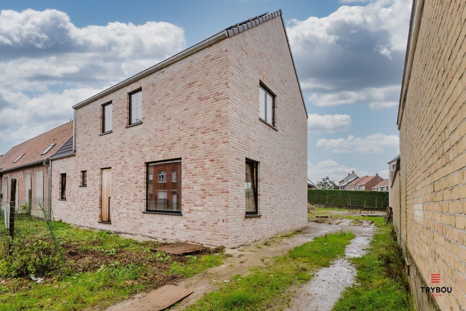 Halfopen nieuwbouwwoning op centrale locatie te Abele foto {{pictureIndex}}