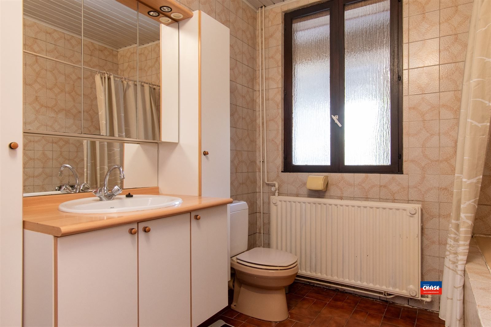 Rijwoning met 3 slaapkamers en gezellige tuin foto 8