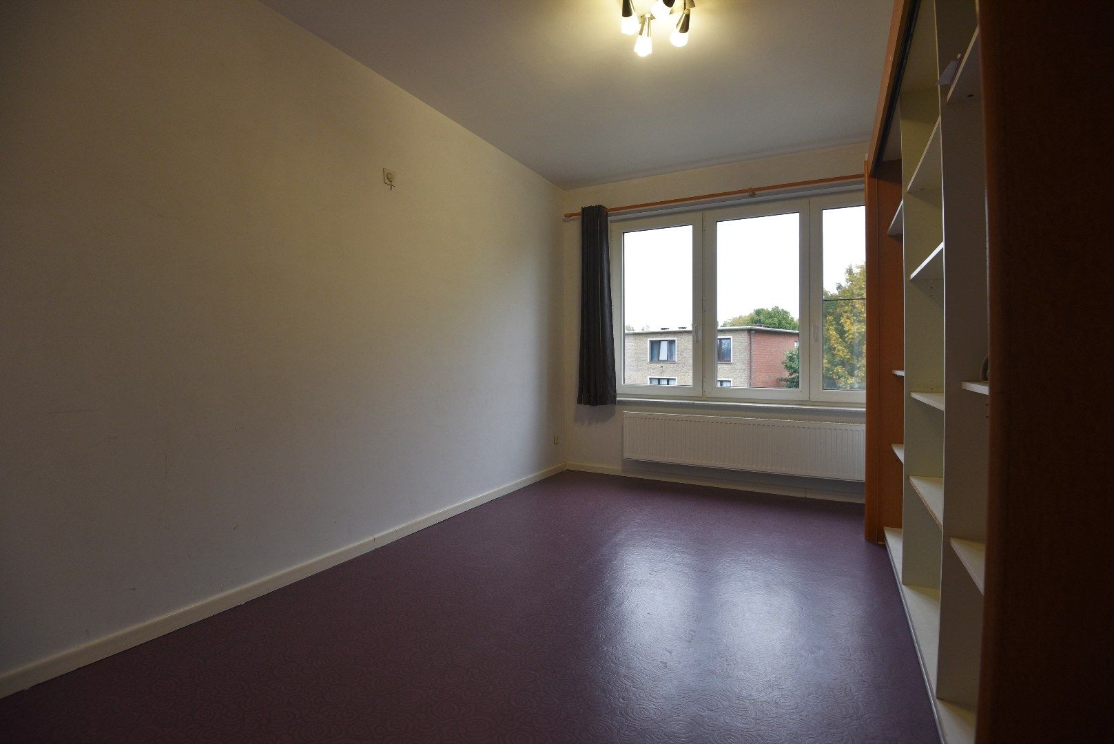 Ruim appartement (108m2) met 2 slaapkamers en autostaanplaats rustig gelegen te Eeklo foto 4
