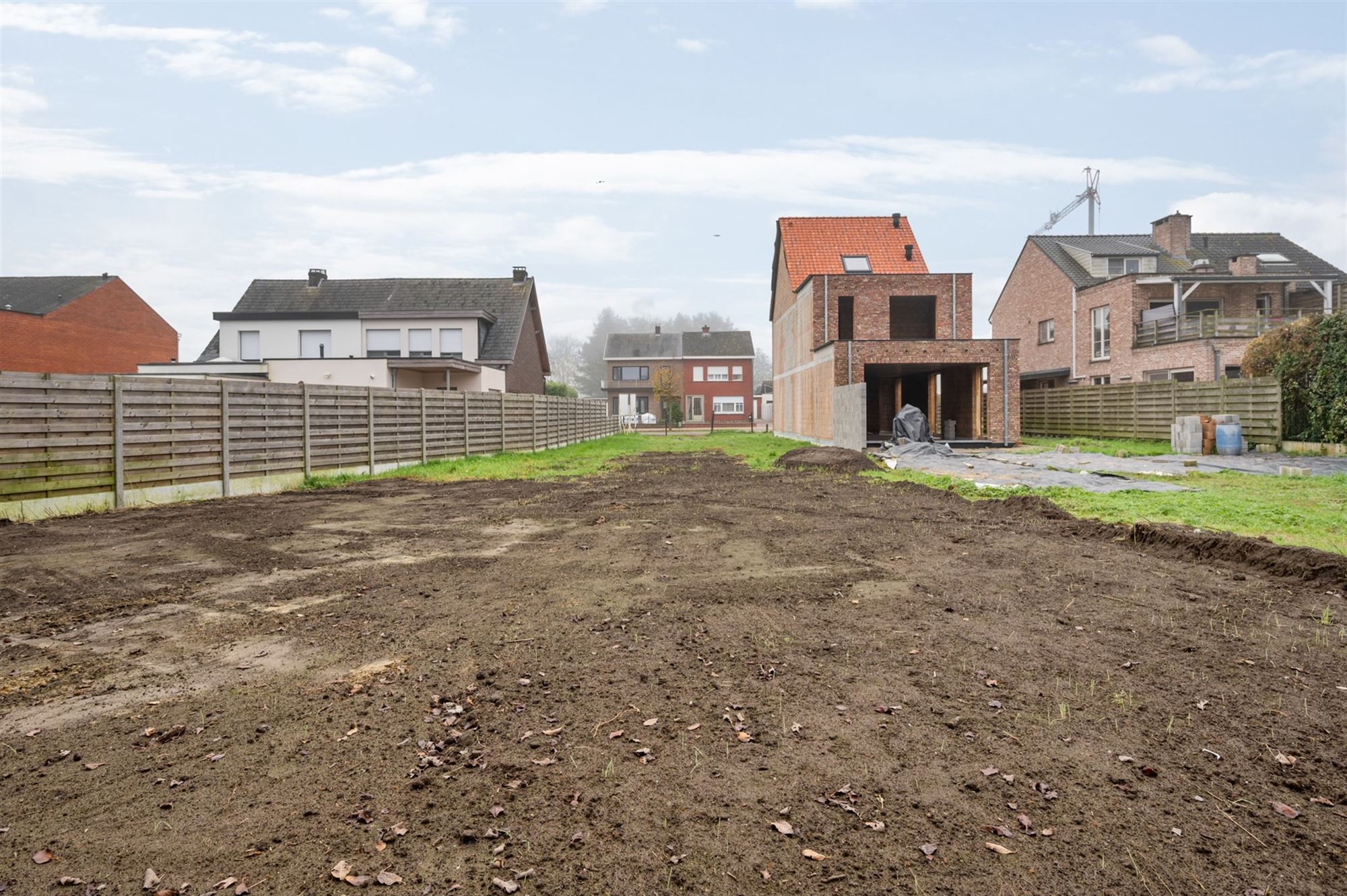 Perceel bouwgrond (650 m2) voor half open bebouwing niet ver van het centrum foto 6