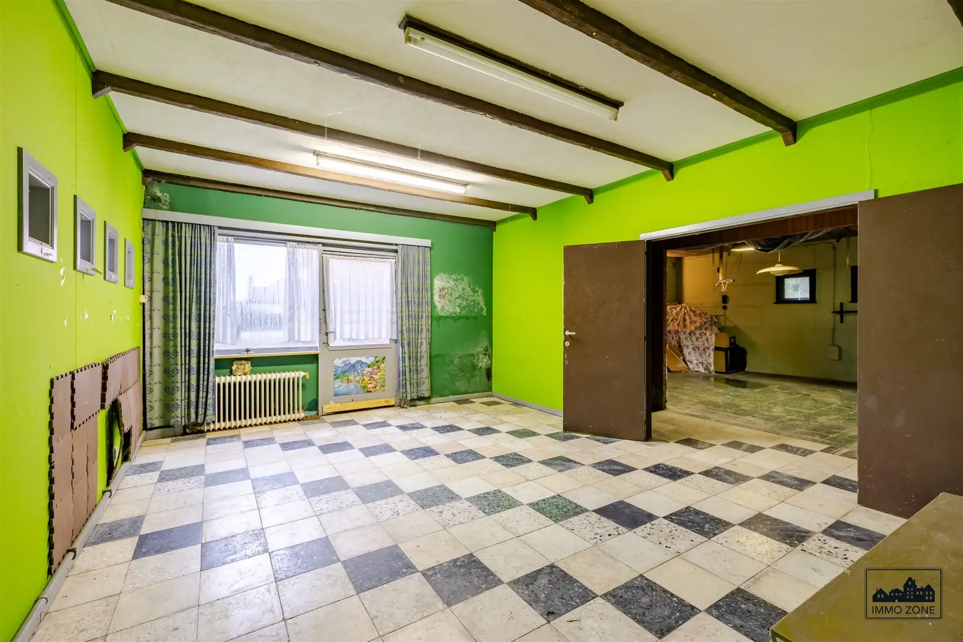 Te renoveren woning op ruim perceel met groene zone foto 10