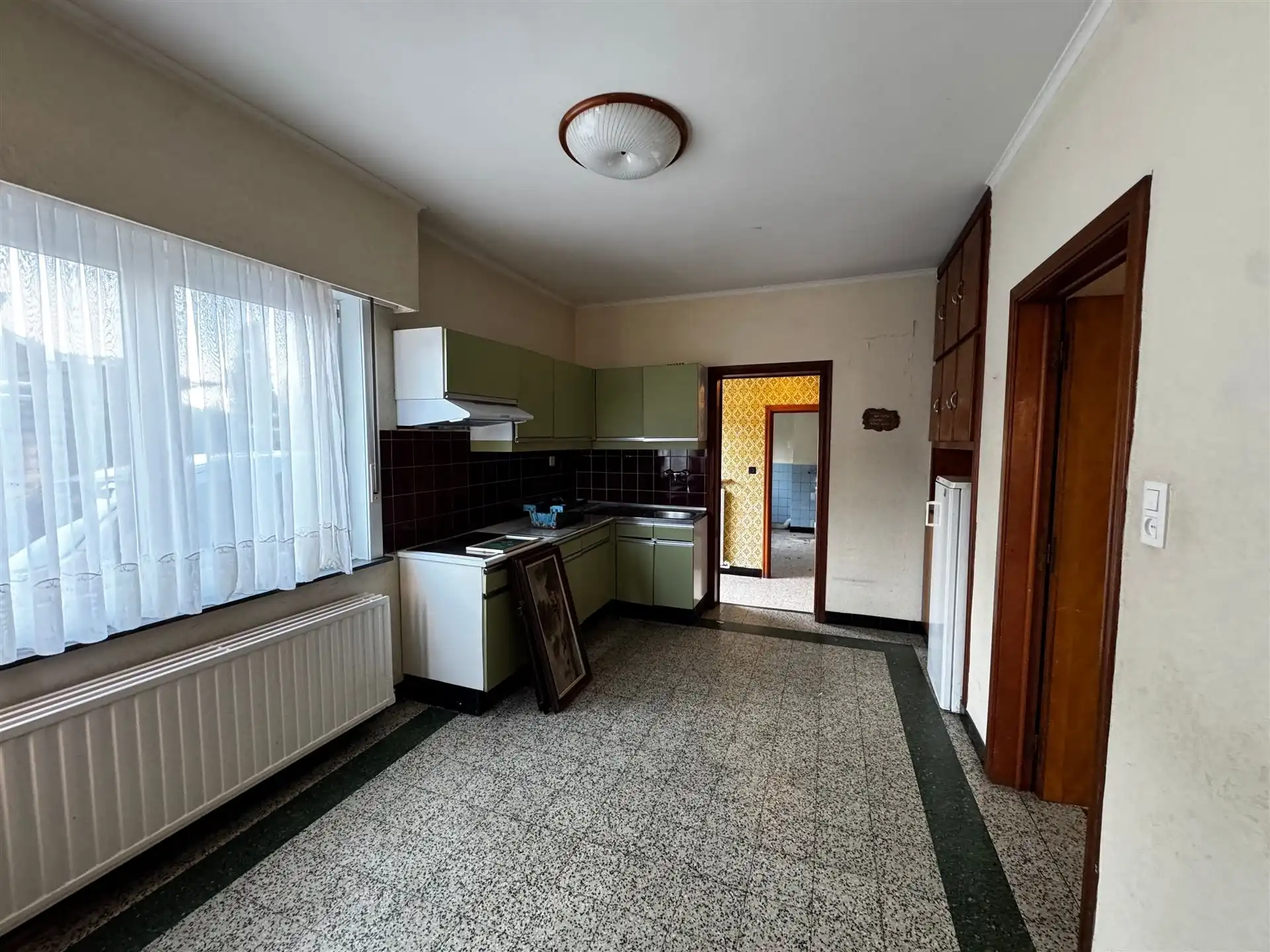 Charmante halfopen woning met uitzonderlijk ruime tuin in Maasmechelen (Boorsem) foto 5