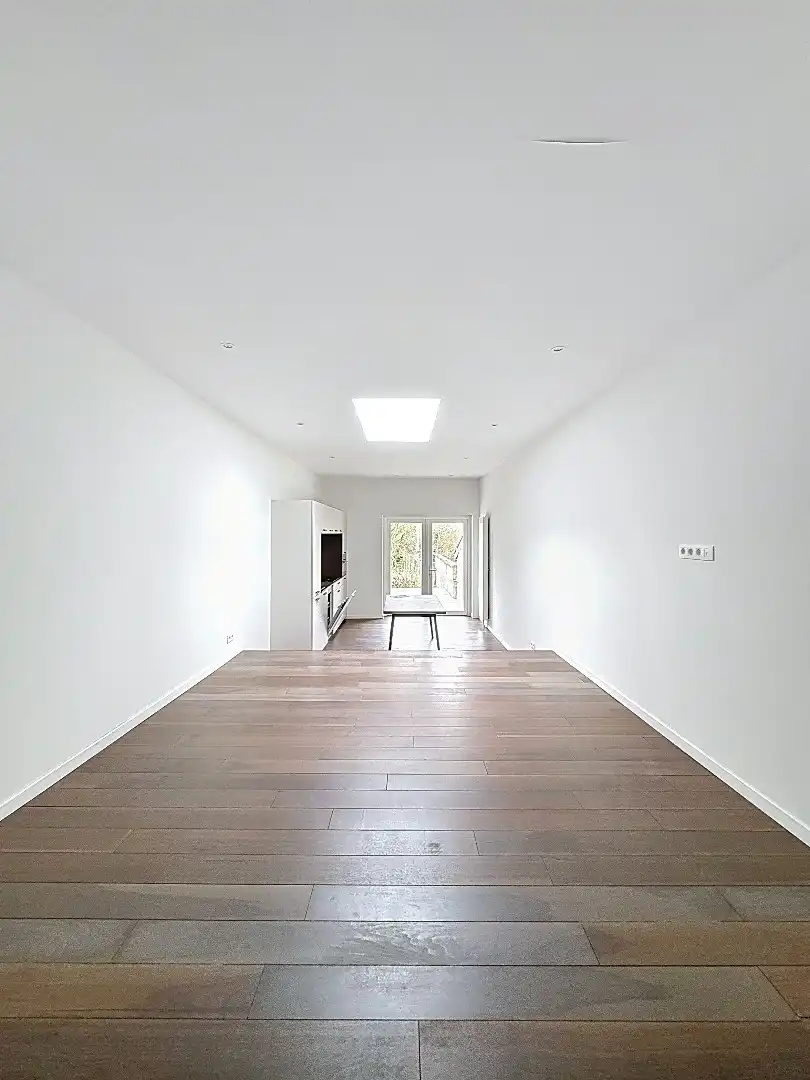 Elegant wonen in Tienen: gerenoveerde rijwoning met 3 slaapkamers en zuidwestgerichte tuin. foto 6